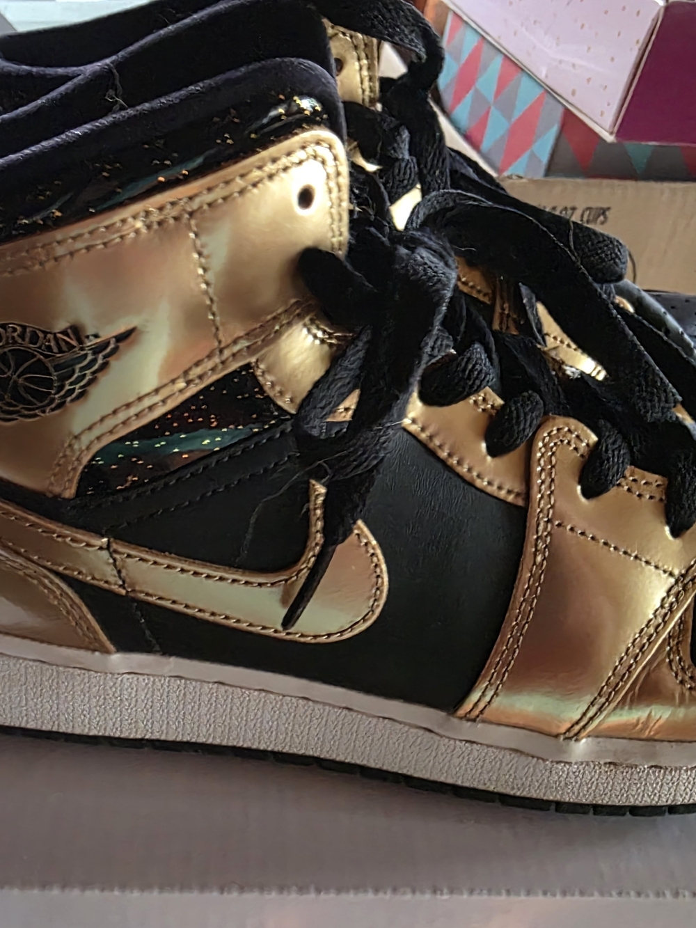 Air Jordan Metallic Gold & Black High Top Sneakers